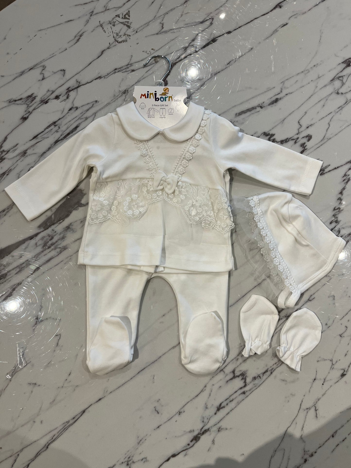 White baby grow