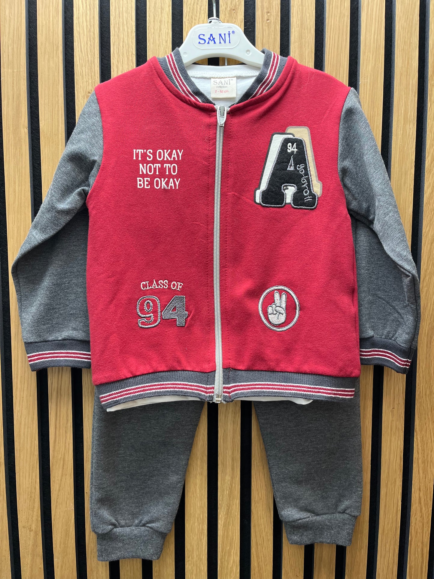 Red varsity tracksuit